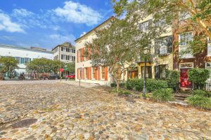 Cobblestone street and row houses in Charleston, SC