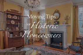 Beautiful interior of a historic home with detailed molding and antique furniture. Superimposed is the name of the blog, "Moving Tips for Historic Homeowners."