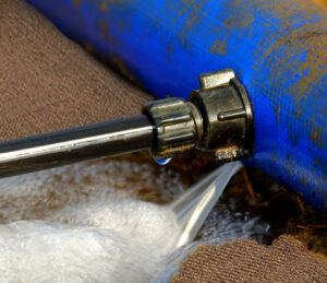 burst water pipe leaking on carpet