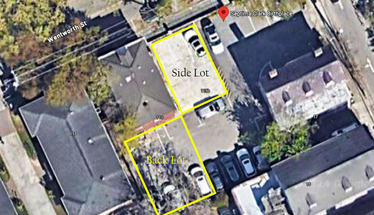 Aerial view of 115 Wentworth Street with parking lot next to and behind it.