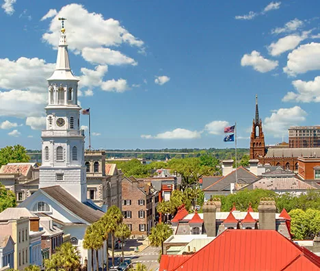 Rooftop view of historic downtown Charleston including St. Michael's and St. Phillip's steeples