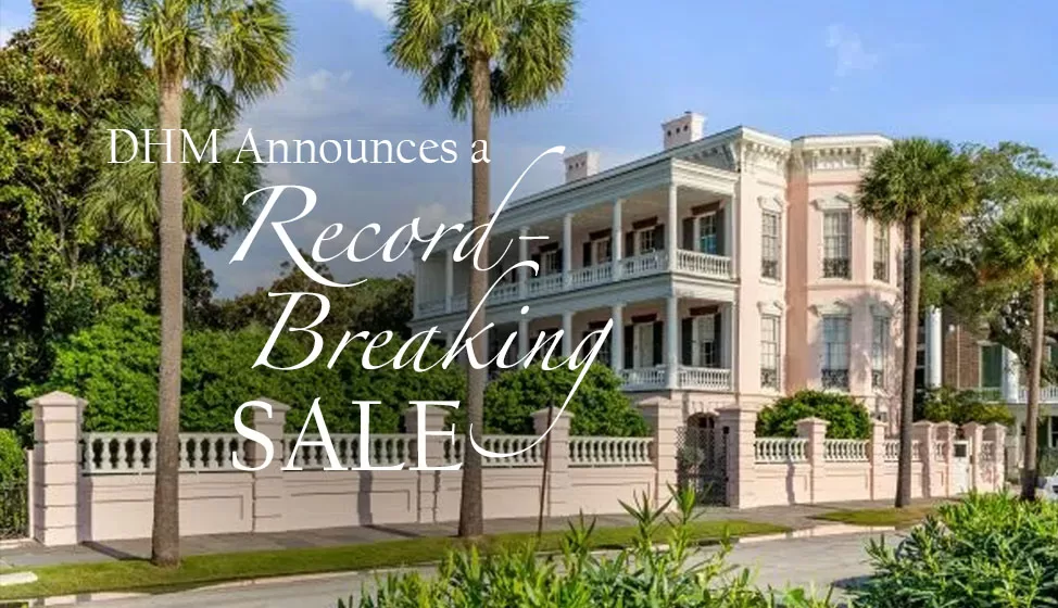 Photo of the iconic pink house at 5 East Battery in historic downtown Charleston, SC with the title "DHM Announces a Record-Breaking Sale"