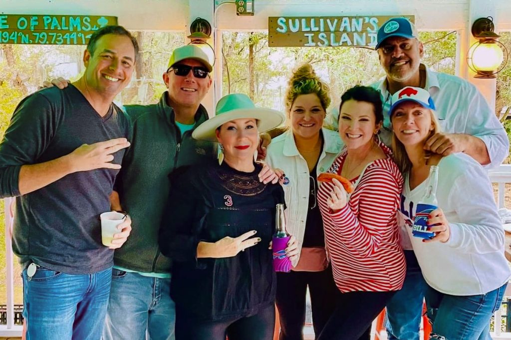 Friends enjoying a sports bar in Charleston, SC  